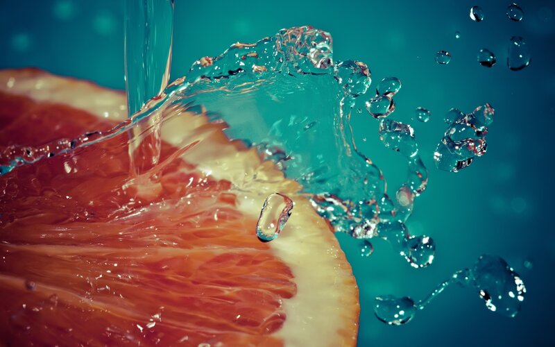 Grapefruit Slice with Water — Red, Dynamic, Photograph