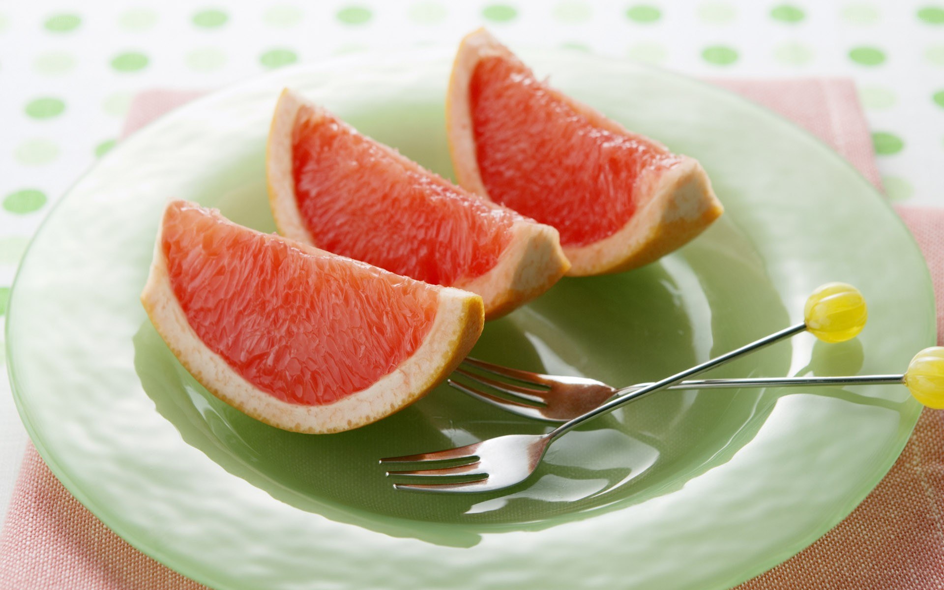 Grapefruit slices on a plate