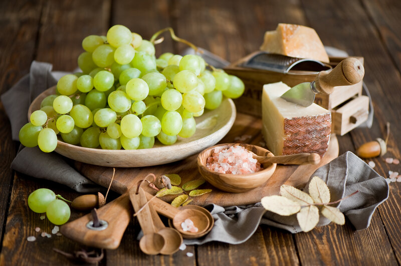 Grapes and Cheese on Wood