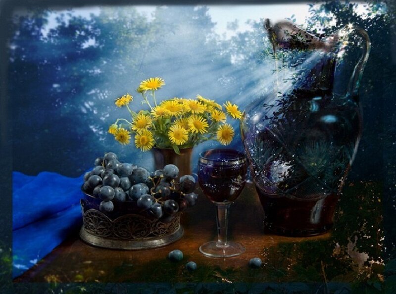 Grapes and Flowers on Table