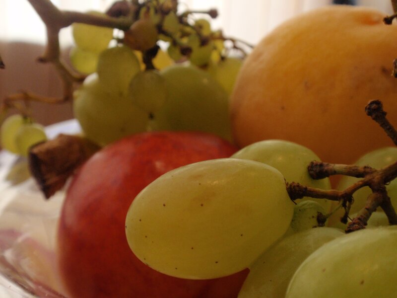 grapes and fruit in a bowl