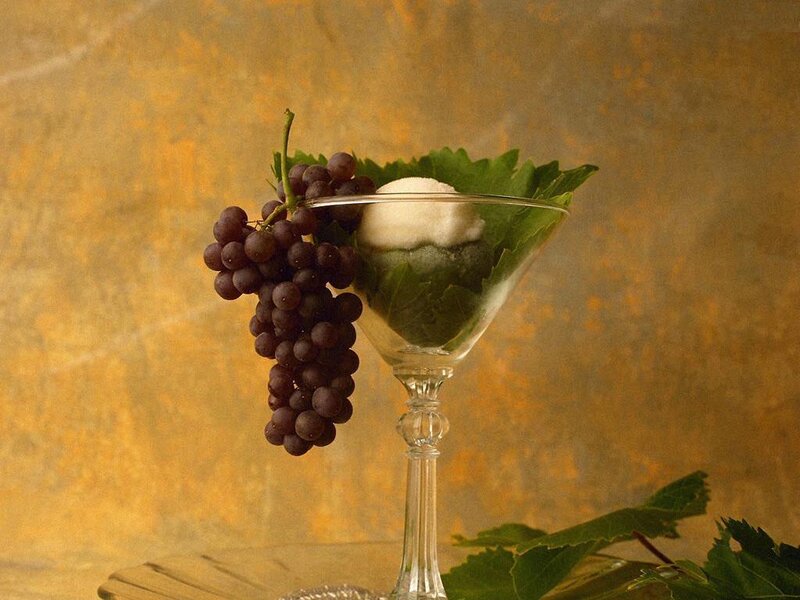 grapes and ice cream in a glass