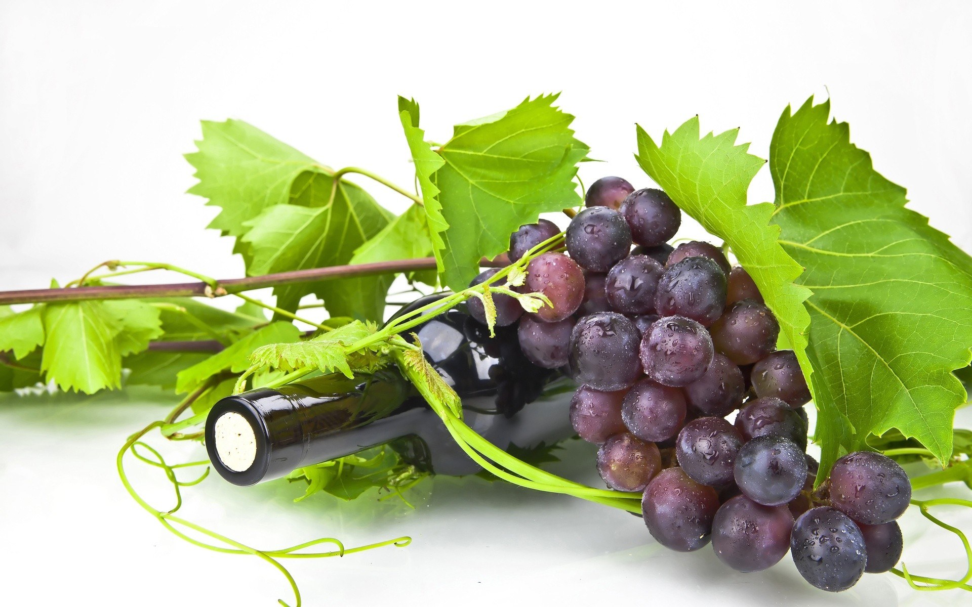 grapes and wine bottle