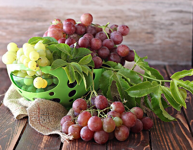 Grapes in a Green Basket
