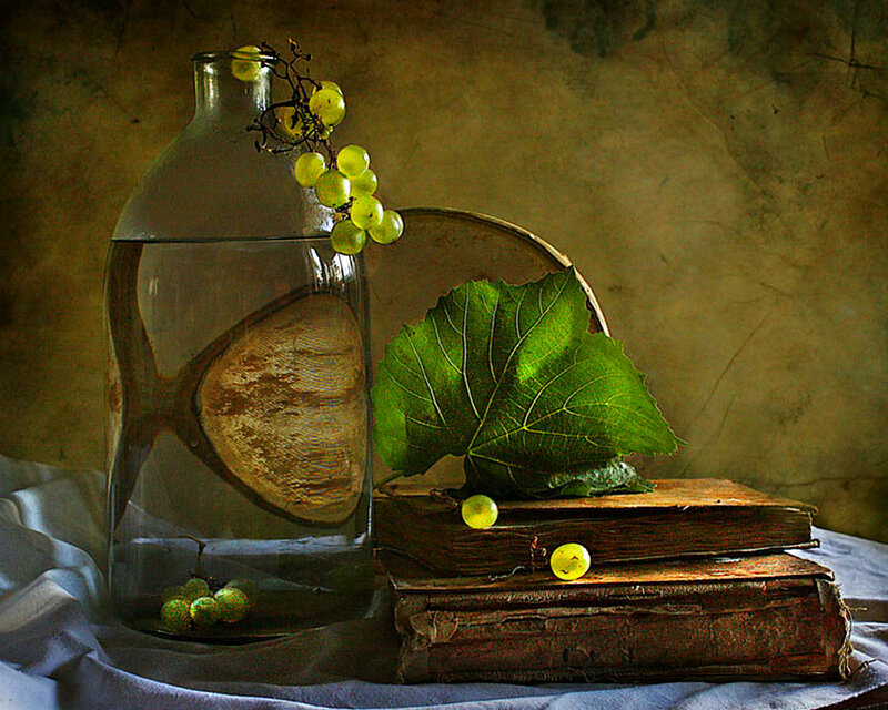 Grapes in Glass Bottle
