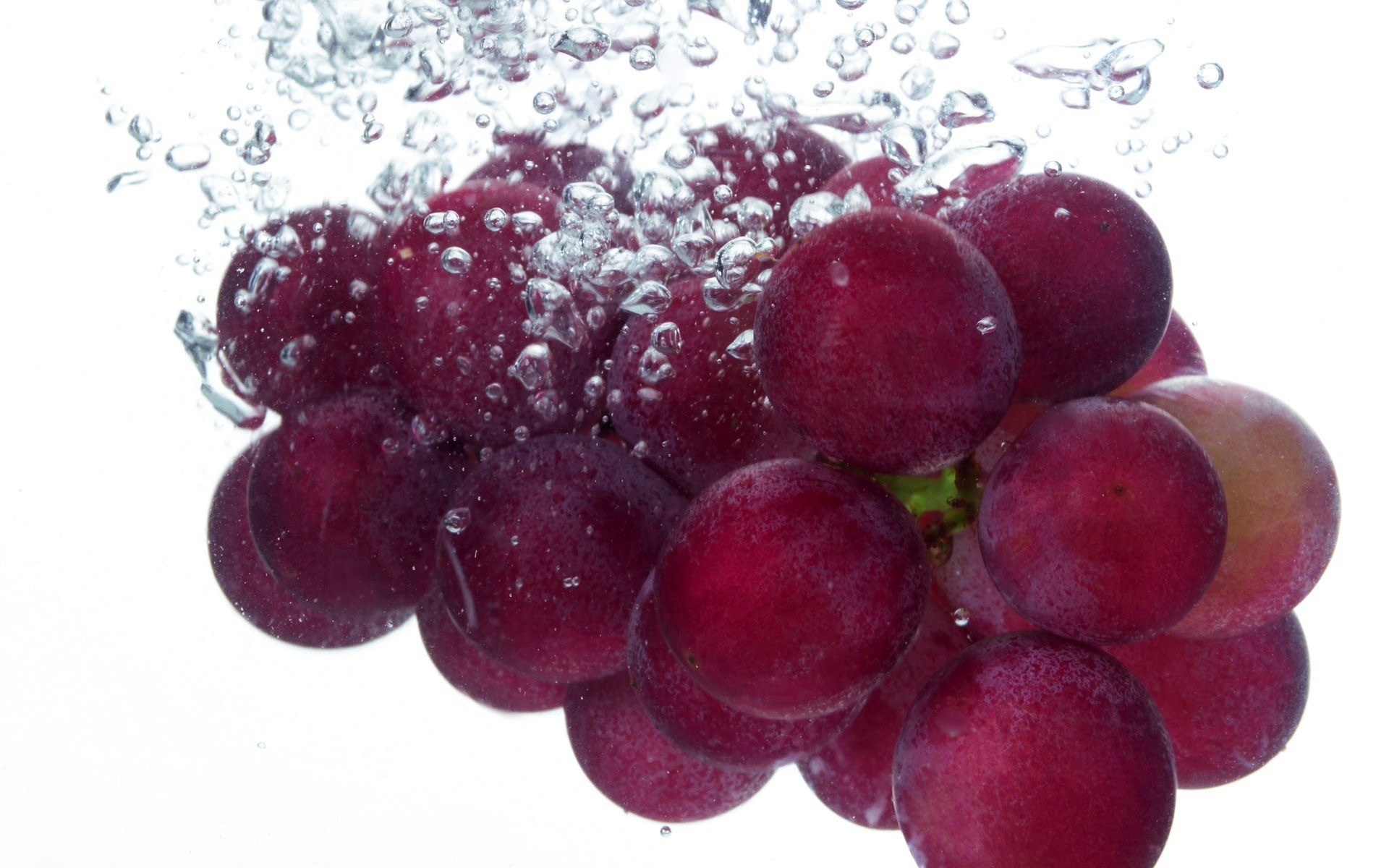 grapes in water with bubbles
