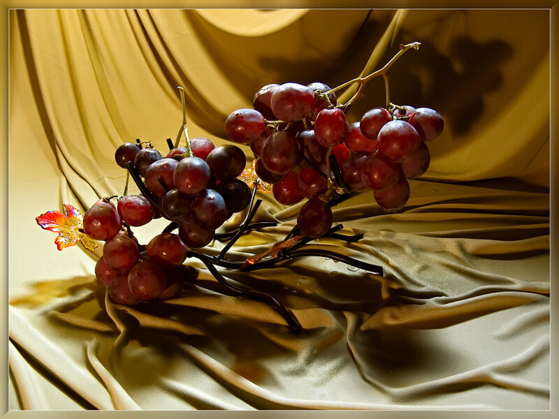 grapes on golden fabric