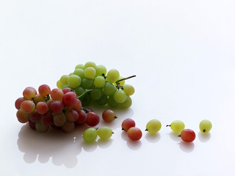 grapes on white surface