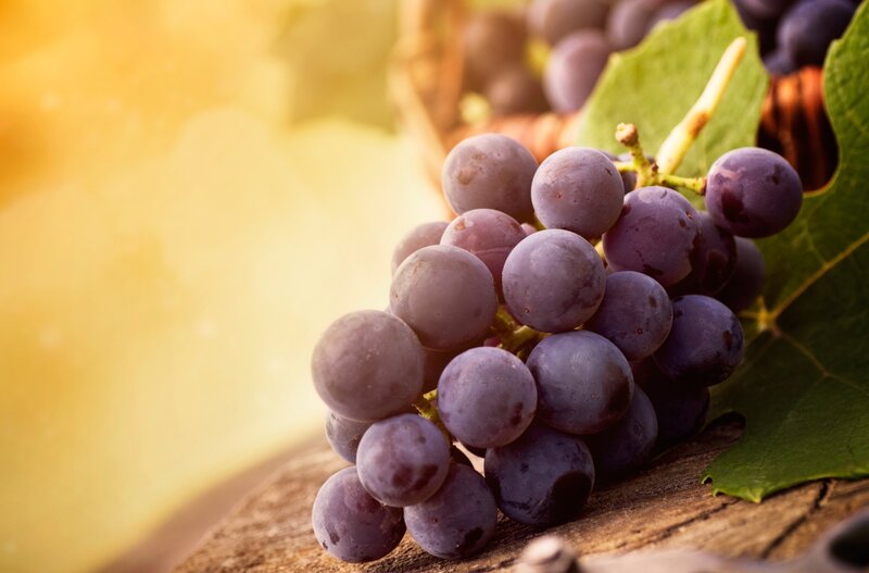 grapes on wooden surface
