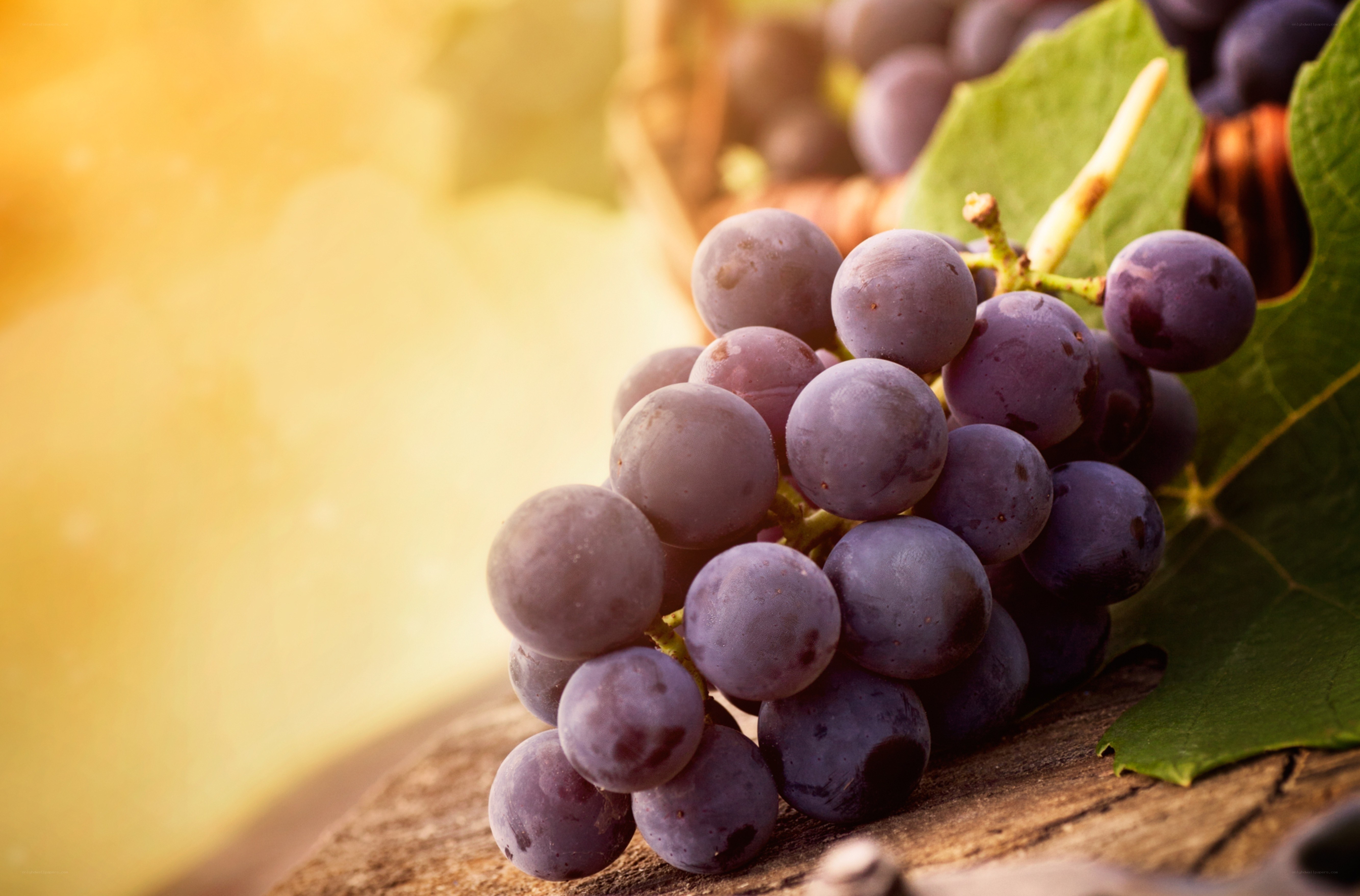 grapes on wooden surface