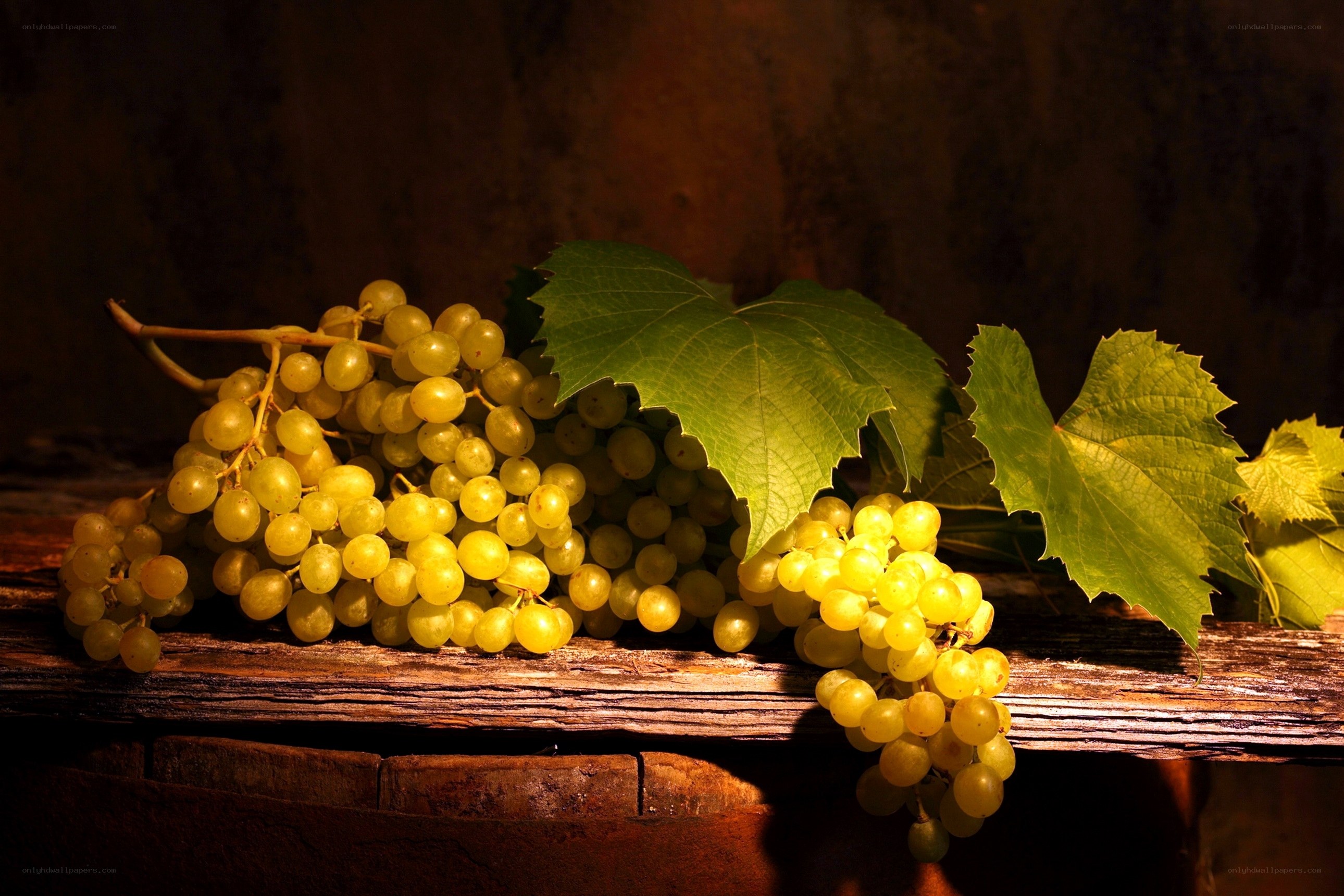 grapes on wooden surface