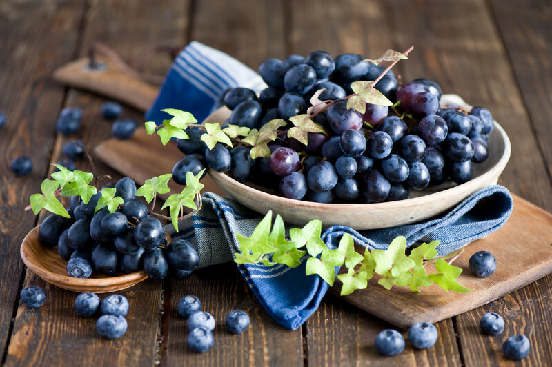 Grapes on Wooden Table