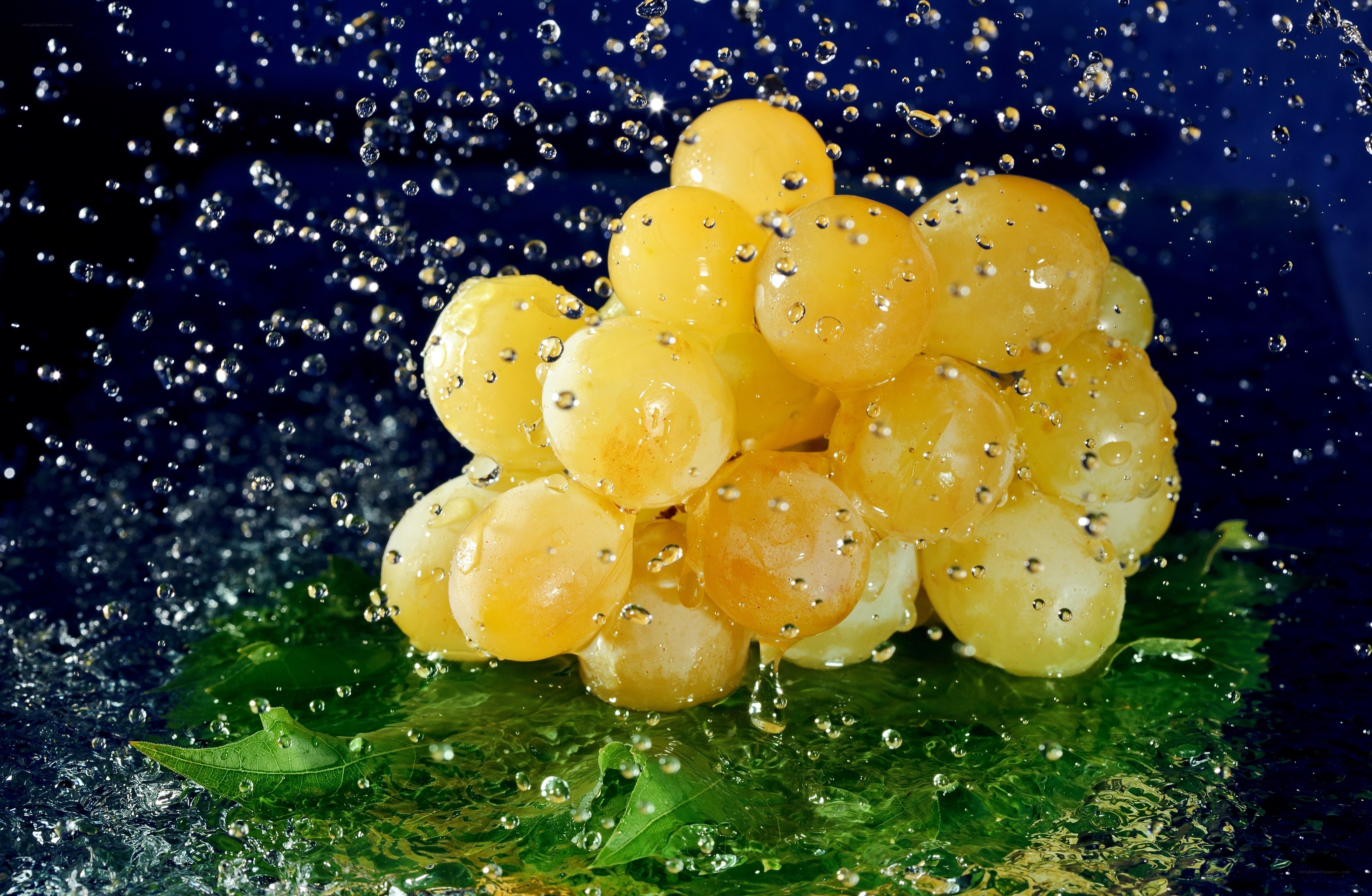 grapes splashing in water