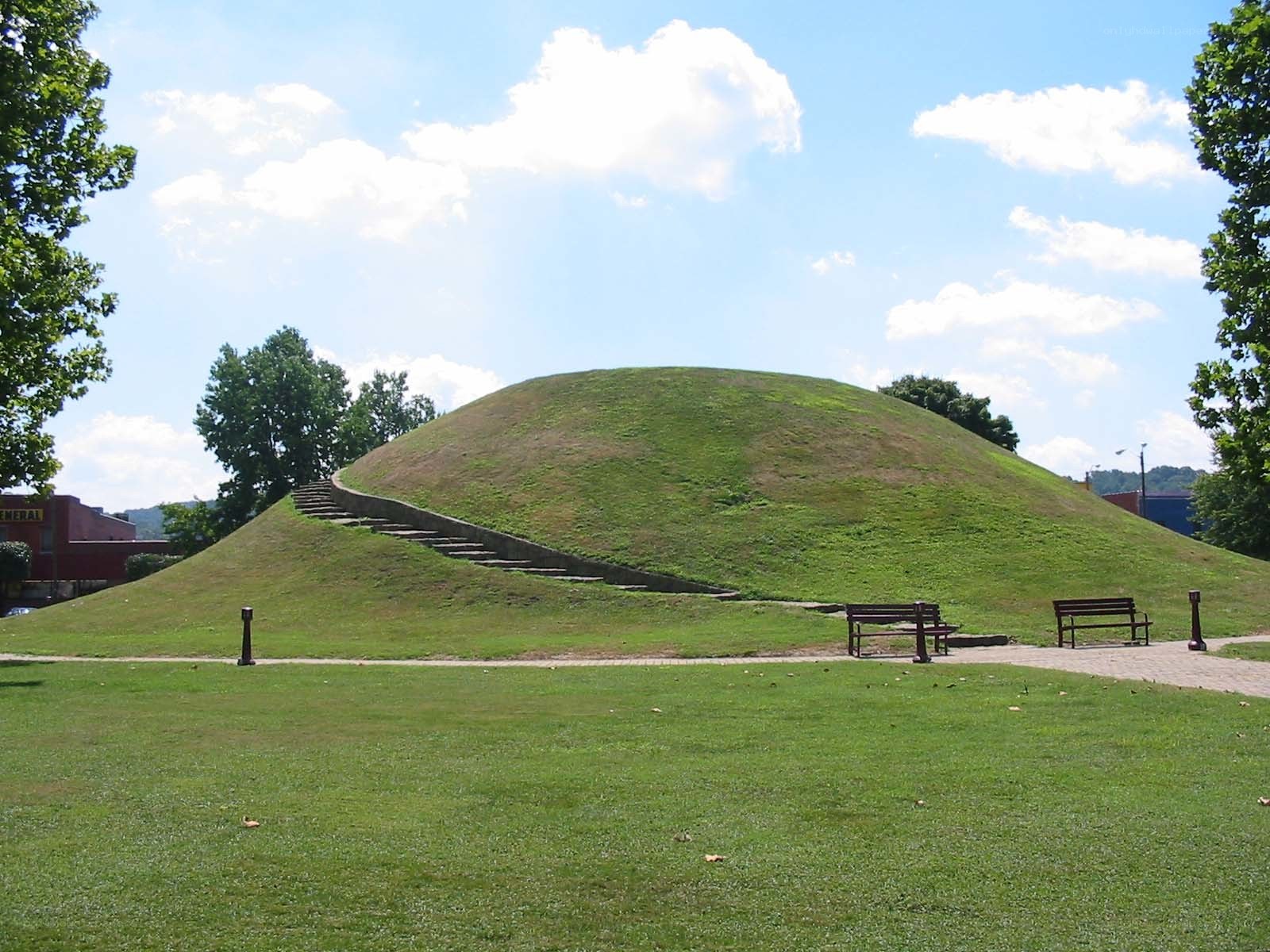 Grass-covered mound with stairs