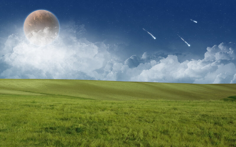 Grass field under alien sky