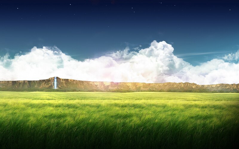 Grass field with waterfall