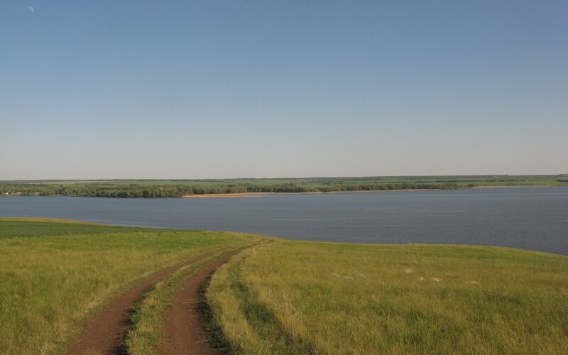 Grass path to a lake
