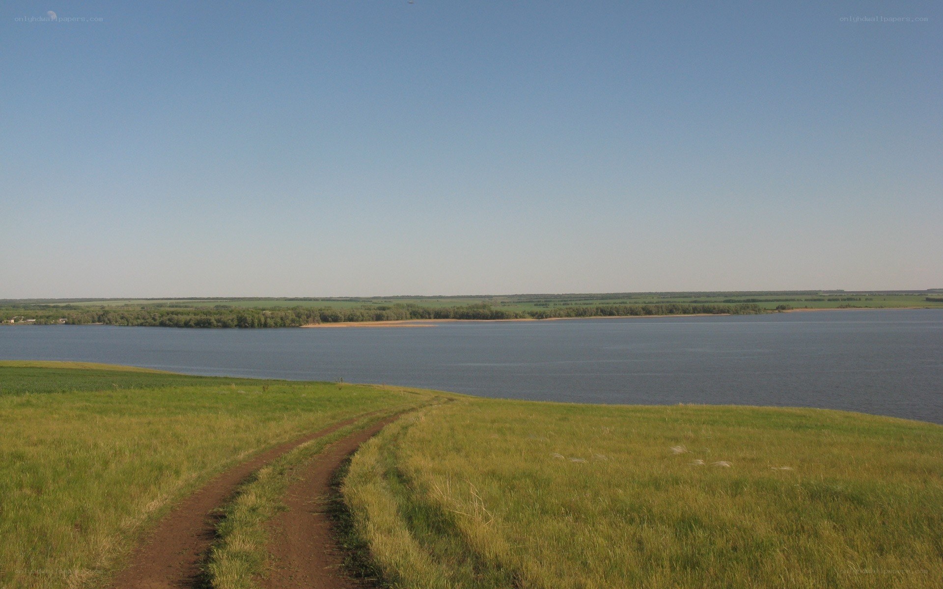 Grass path to a lake