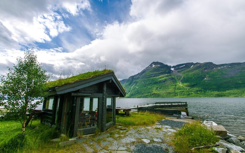 Grass-roof Cabin by Lake