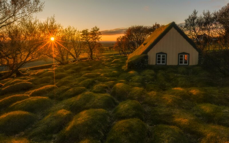 Grass-roofed House — Green, Serene, Sunrise