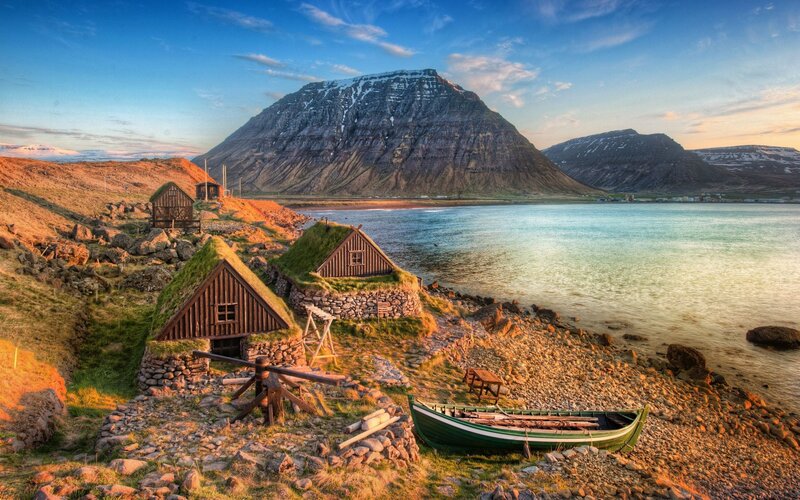 Grass-roofed Houses by Sea