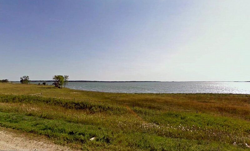 Grassy Field by Lake — Green