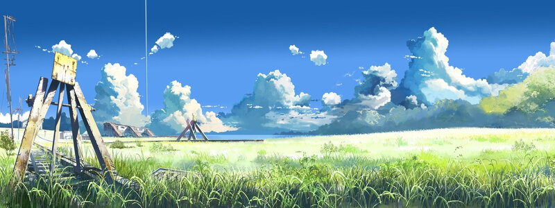 Grassy field with old railway