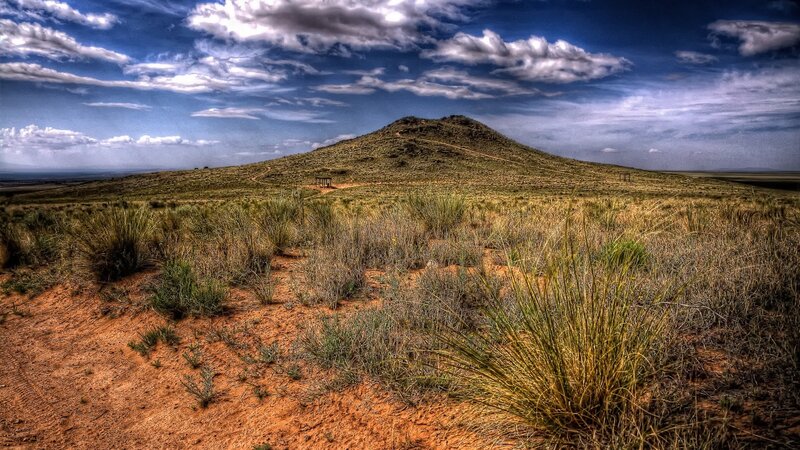 Grassy Hill under Cloudy Sky — Blue, Dramatic