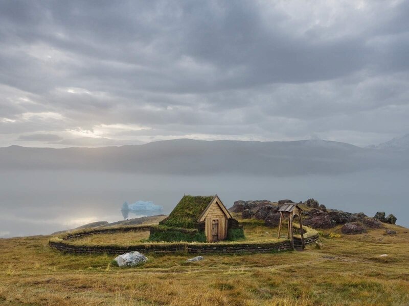 Grassy hut on a coastal hill