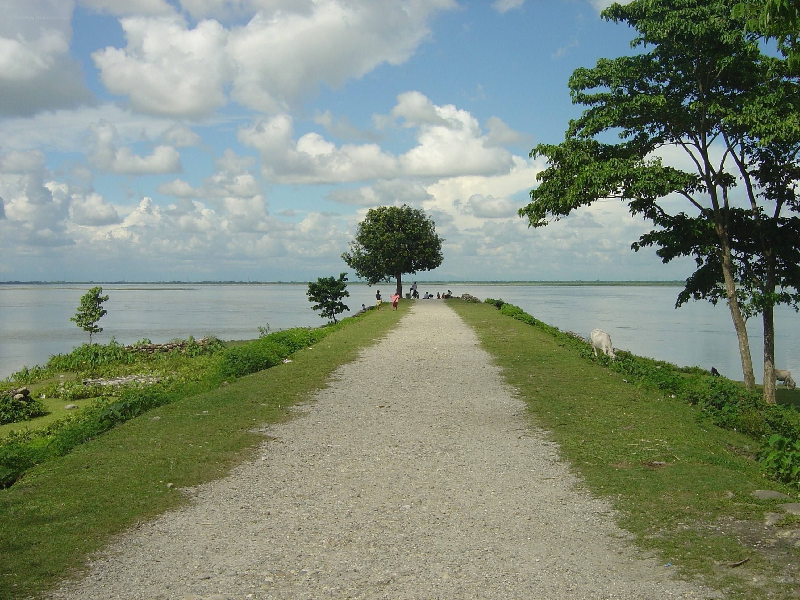 Gravel path by a wide river