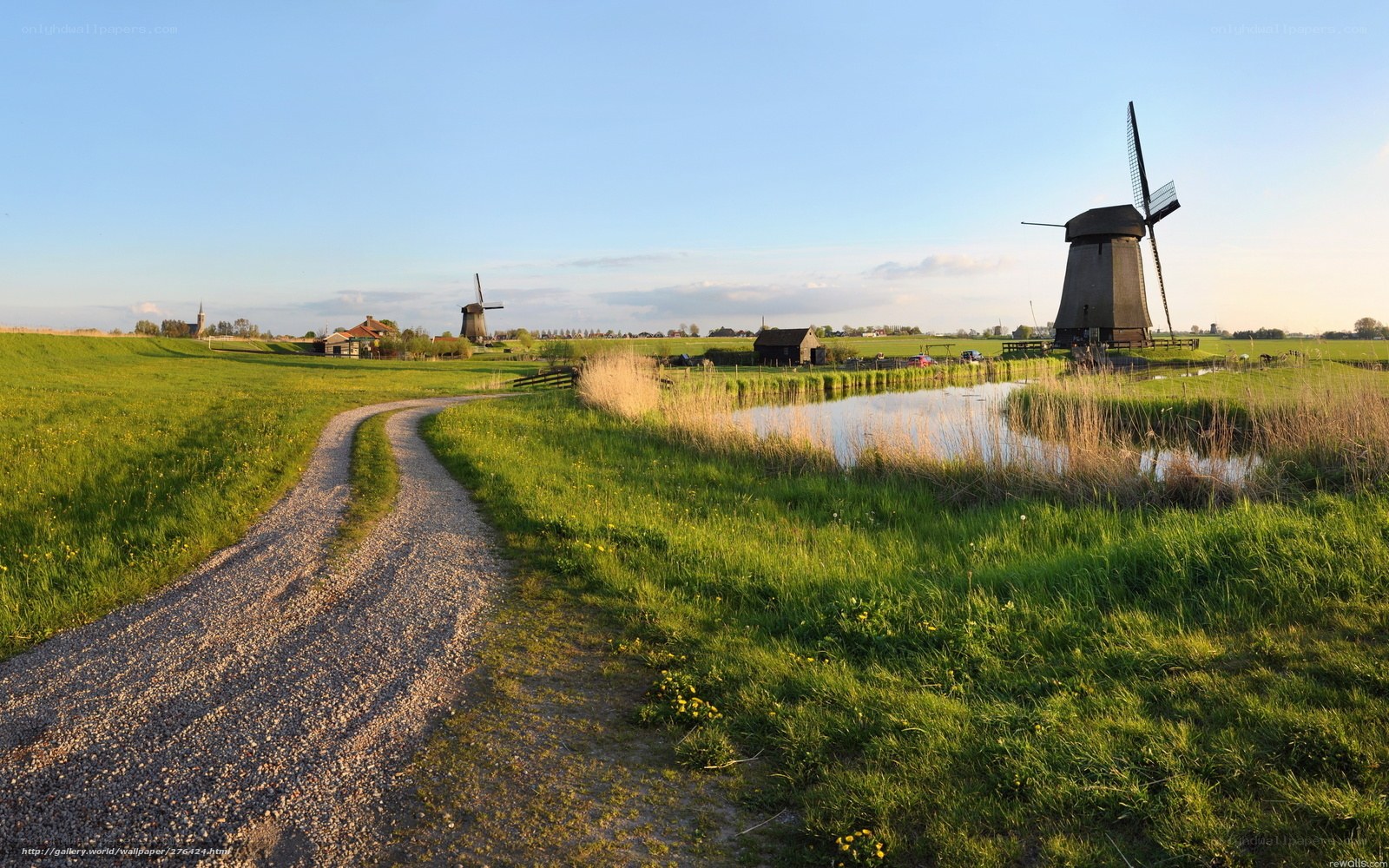Gravel path by windmills
