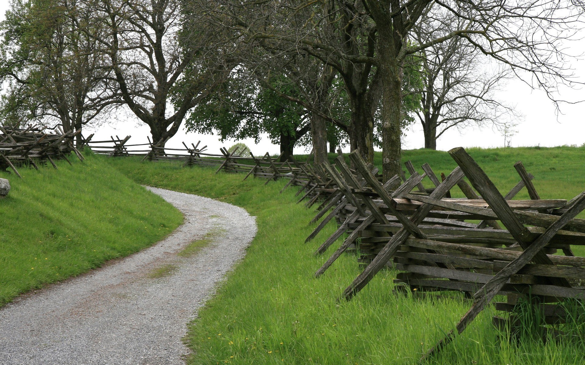 Gravel path with split-rail fence