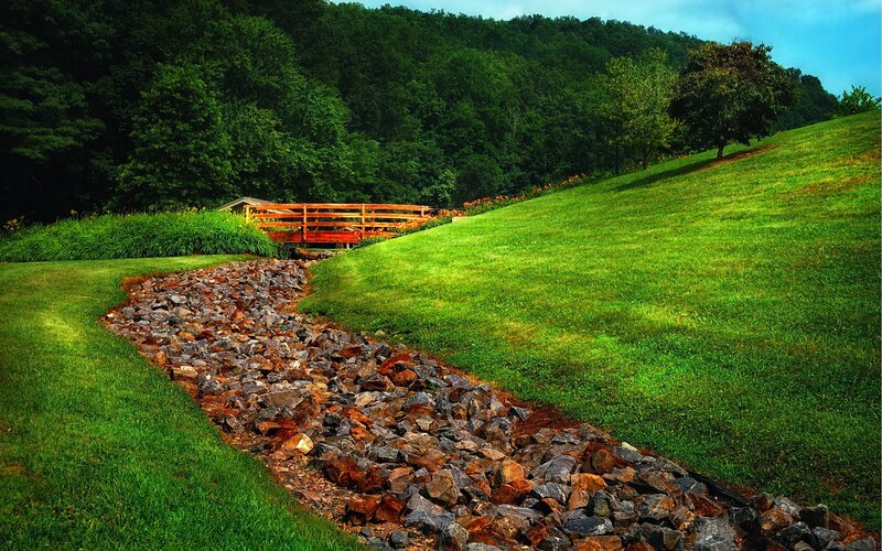 Gravel path with wooden bridge