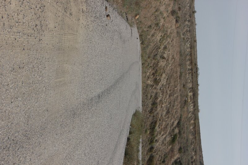 gravel road in arid landscape