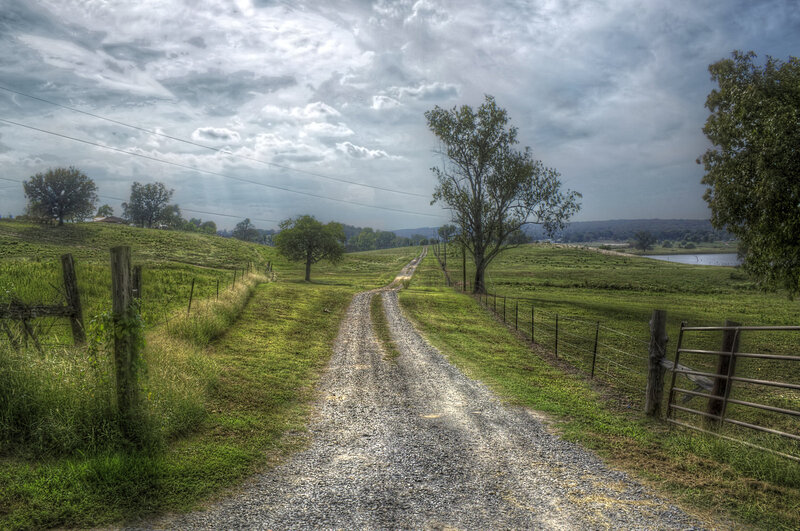 Gravel Road in Countryside — Green, Dramatic