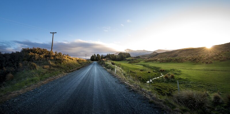 Gravel Road in Countryside — Green, Serene, Sunrise