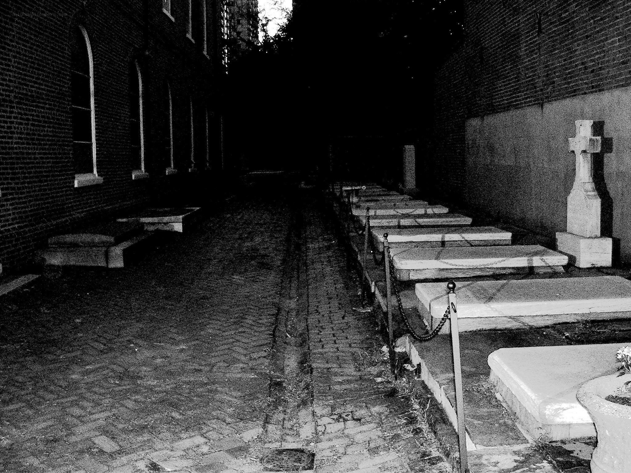 Gravestones in a courtyard
