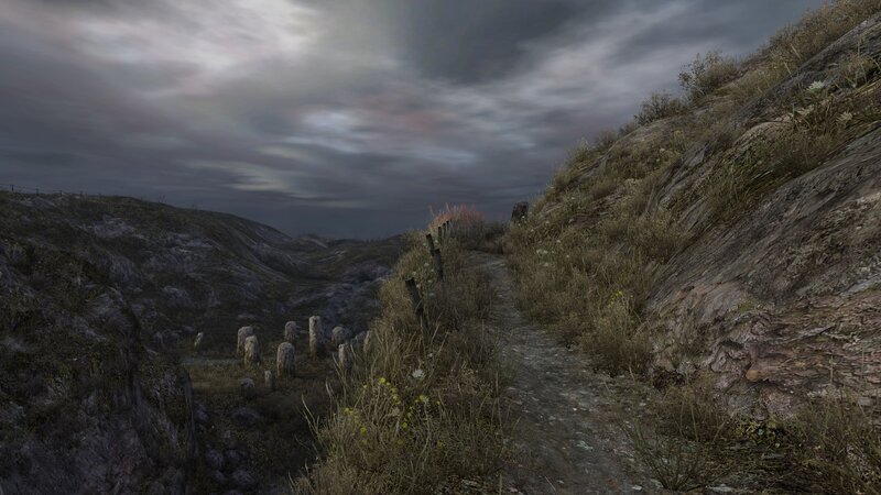 Graveyard path in rocky hills