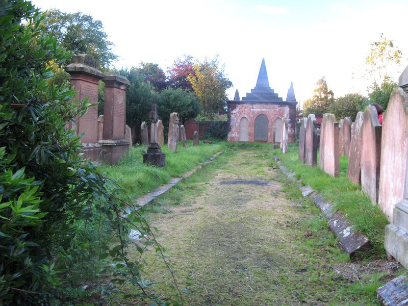 Graveyard path with mausoleum