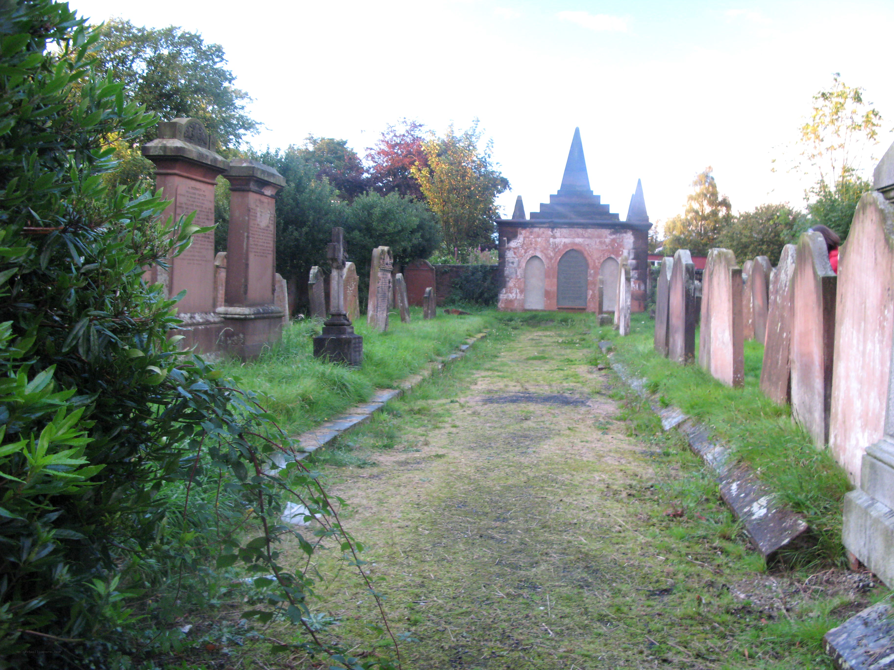 Graveyard path with mausoleum