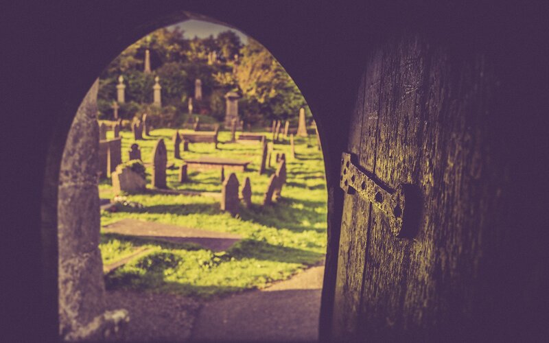 Graveyard Through Arched Door