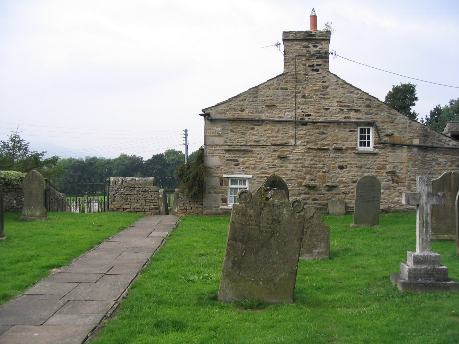 Graveyard with stone church