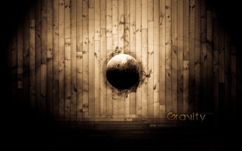 Gravity concept on wood