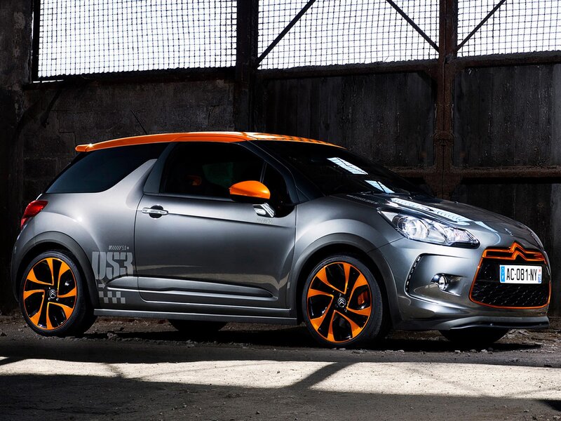 gray and orange car in garage
