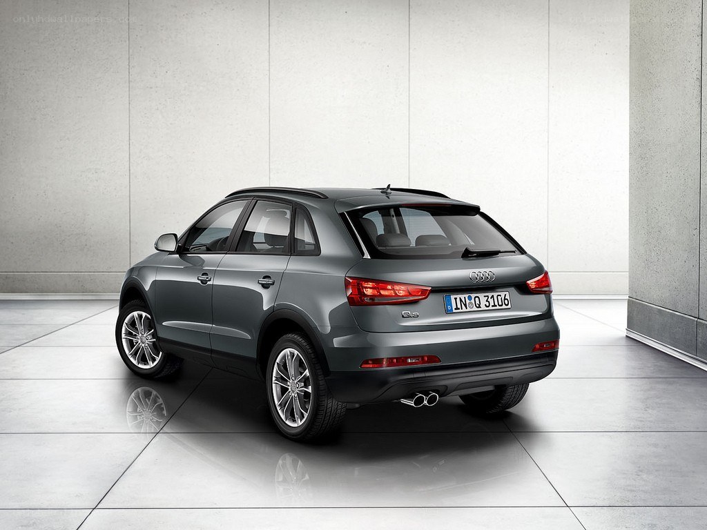Gray Audi Q3 SUV rear view