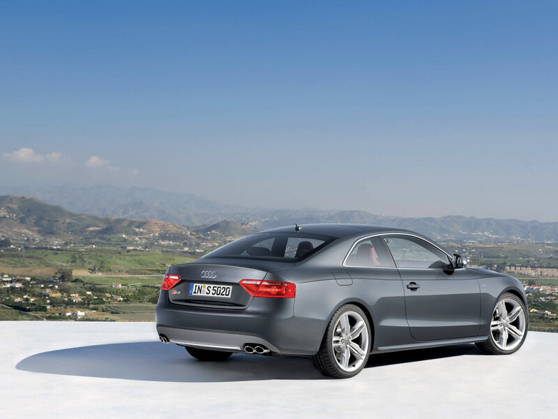 Gray Audi S5 on a scenic overlook