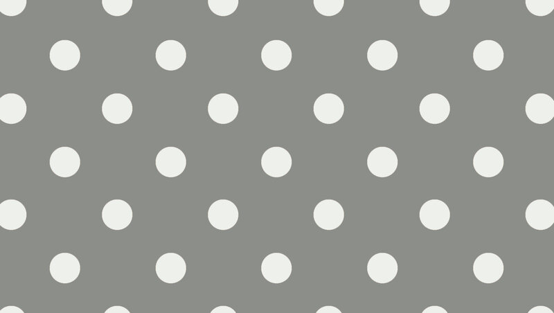 gray background with white polka dots