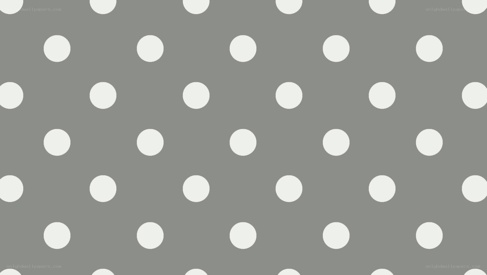 gray background with white polka dots