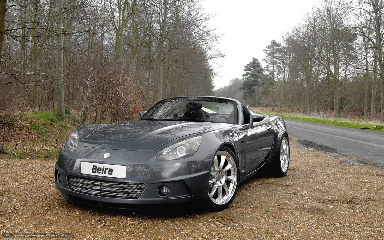 Gray Beira convertible on gravel