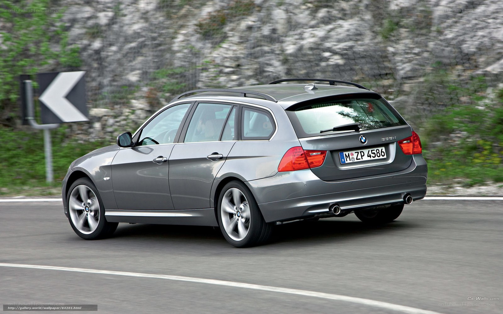 gray bmw 3-series wagon driving